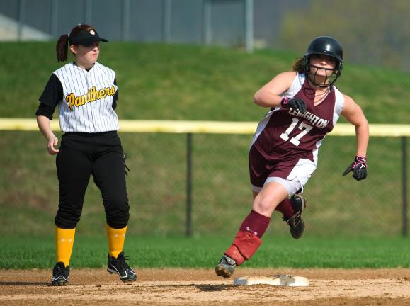 Lehighton's Brook Lucykanish (17) rounds second base on her way to a two-run homer against Panther Valley. Looking on is Panther second baseman Cassie Schmidt