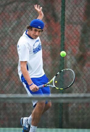 Bob Ford/times news Vince Voulo of Pleasant Valley backhands the ball in his match against Lehighton's James Svercheck.