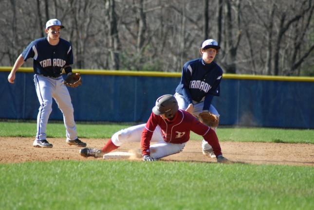 Tamaqua's shortstop Derek Linkhorst, left, and second baseman Ian Nichols watch as Pottsville's Nick Schlitzer steals second base during Thursday's game. Ron Gower/TIMES NEWS