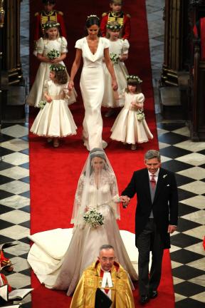 Bride Kate Middleton walks down the isle with father Michael at Westminster Abbey, central London, for her wedding to Britain's Prince William, Friday April 29, 2011. (AP Photo/Andrew Milligan/Pool)
