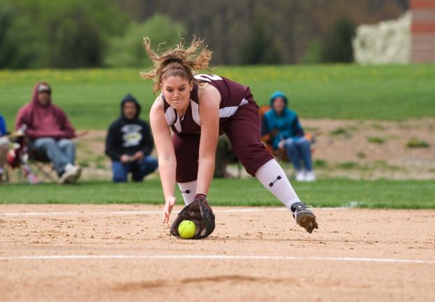 bob ford/times news Lehighton's Ashley Sensinger scoops up the ball at third base during Friday's game against Stroudsburg.