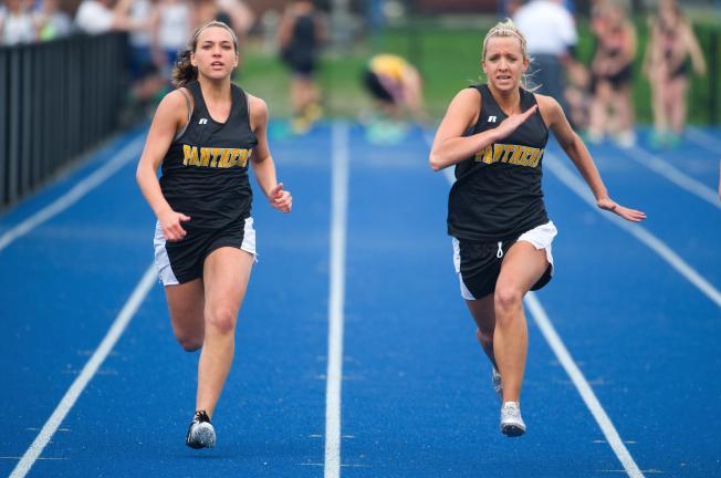 BOB FORD/TIMES NEWS Panther Valley's Olivia Markovich (right) and Rylie Krapf head for the finish line in the 100-meter dash. Markovich finished second and Krapf third.