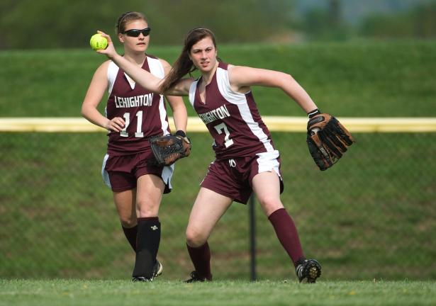 bob ford/times news Lehighton's rightfielder Brooke Lucykanish tosses the ball back to the infield as teammate Krysten Breiner backs up.