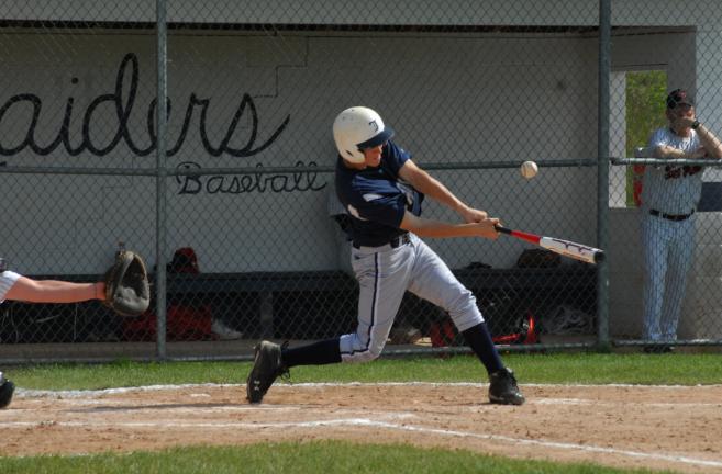 ron gower/times news Tamaqua shortstop Derek Linkhorst fouls off a pitch against Tri-Valley. The Raiders dropped a 10-5 decision.