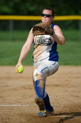 bob ford/times news Marian's Kayla Knight unwinds with a pitch against Nativity.