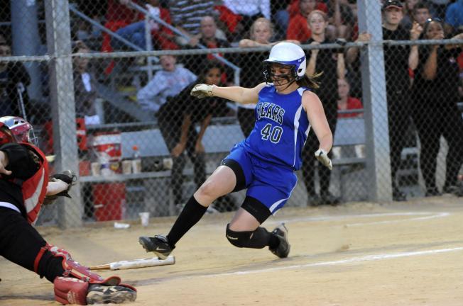 nancy scholz/special to the times news Pleasant Valley's Megan Hardy (40) slides home with a third inning run as Easton catcher Brooke Limeberry stretches for a wide throw.
