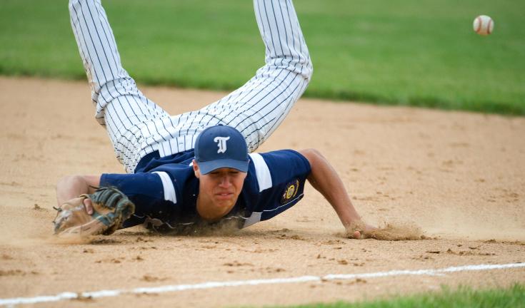 BOB FORD/TIMES NEWS Tamaqua's Jordan Heisler makes a diving attempt to catch a sharp liner hit down the first base line, but comes up short.