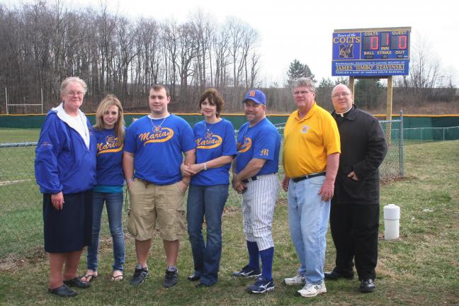 @Caption Stand Alone:Scoreboard dedication at Marian High School A new baseball scoreboard was dedicated during the high school baseball season in memory of James "Jimbo" Stavinski. The team honored Stavinski by dedicating their winning season to…