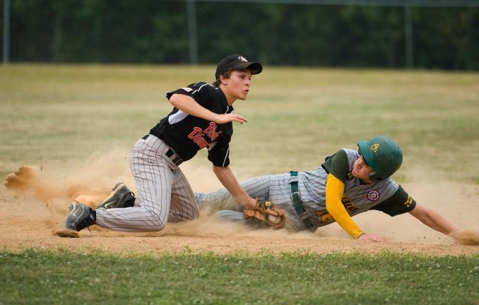 bob ford/times news Panther Valley Black Diamond second baseman Brandon Gurka puts the tag on the Pocono Mountain Outlaws' Tommy Robson. Robson was safe on the play.