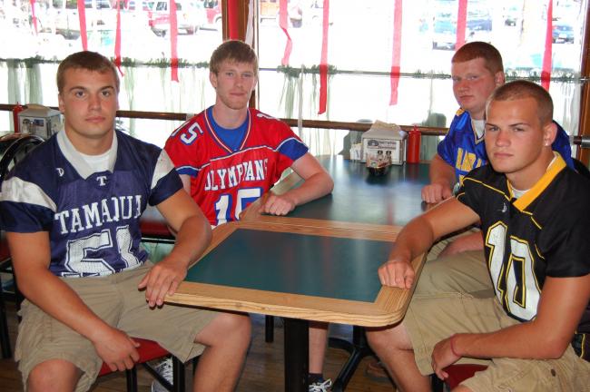 Brad Hurley/TIMES NEWS The Schuylkill County Football Coaches Association held their annual media day Thursday in Pottsville. Some of the local players in attendance included, from left, Tamaqua's Anthony Iacovellio, Jim Thorpe's Ben Moore, Marian's…