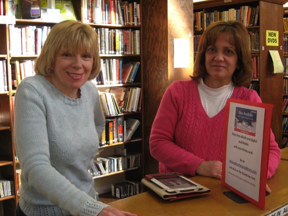 STACEY SOLT/SPECIAL TO THE TIMES NEWS Palmerton Area Library employees Marian Hoffner, left, and Mariann Kmetz, assistant director, shared how eReaders will connect to the new Carbon Lehigh Downloadable Library. The downloadable library, which…