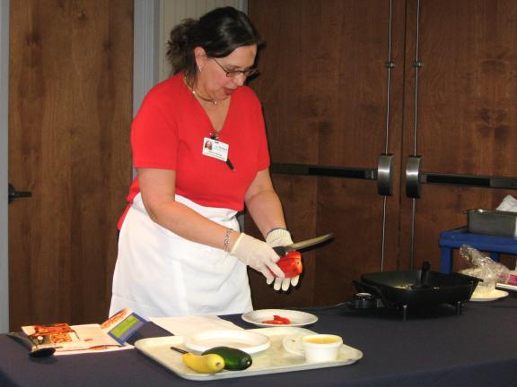 STACEY SOLT/SPECIAL TO THE TIMES NEWS Registered dietitian Nancy Matyas prepares barbecued tofu and vegetables during a cooking demonstration and seminar, offered by Blue Mountain Health Systems.
