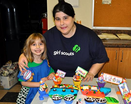 Albrightsville Troop 30137 Daisy Olivia Rosenberger and her mother Lisa stand by her entry "Candy Circus" which won Most Creative at the Service Unit 309, 2012 Girl Scout Bake Off which was held at Saint John's Lutheran Church on North Street in Jim…