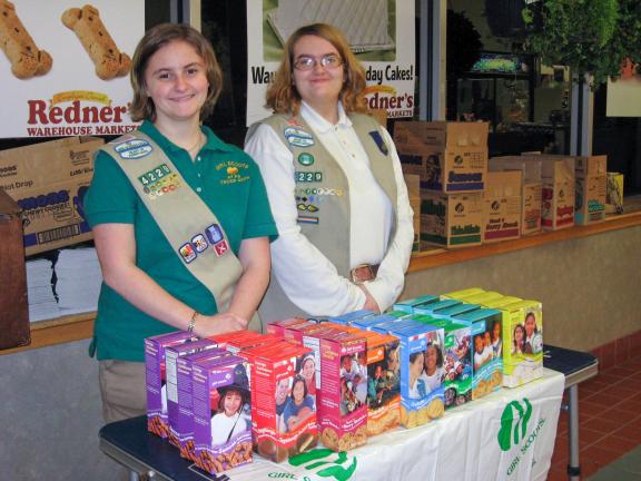 STACEY SOLT/SPECIAL TO THE TIMES NEWS Meeghan Rossi, 15, an Ambassador Girl Scout; and Brooke Turner, 15, a Senior Girl Scout, both from Troop 34229, sell cookies outside Redner's Warehouse Market in Nesquehoning. Girl Scouting isn't just about…