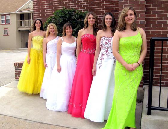 STACEY SOLT/SPECIAL TO THE TIMES NEWS Modeling some of the gowns available at the annual Blue Ridge Communications Prom and Wedding Dress Sale are, from left, Julianne Farina, Jennifer Brownmiller, Erika Ahner, Michelle DeLuna, Kim Wentz and Beth…