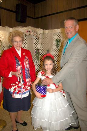 Donald Rehrig, right, mayor of Lehighton, purchases the first poppy of 2012 from Madison Brown, 2012 Miss Poppy of the Shoemaker-Haydt American Legion Unit 314 Auxiliary, center. LaRue Fritz is the Poppy chairman of the Legion Auxiliary and has…
