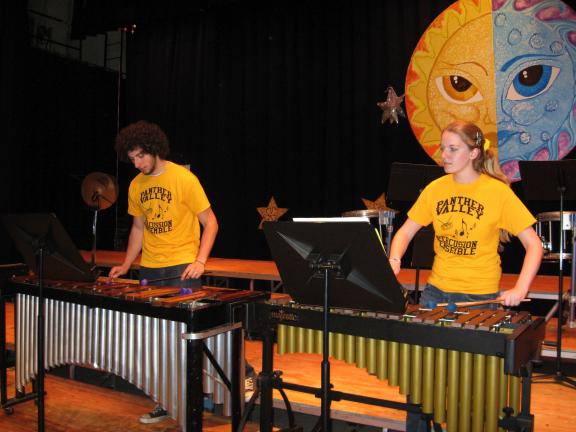 STACEY SOLT/SPECIAL TO THE TIMES NEWS Tamaqua Area High School students Shane Mulligan and Lauren Christ demonstrate "tonal" percussion instruments during the first Panther Valley Percussion Ensemble concert. Christ organized the concert as part of…