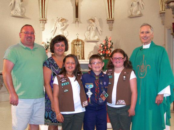 SPECIAL TO THE TIMES NEWS Alexis, Antonio and Amanda Colecio, center, recently received Scouting Religious Awards from Our Lady of Lourdes Parish in Weatherly. Presenting them with the awards are their parents Anthony and Jennifer Colecio, left; and…
