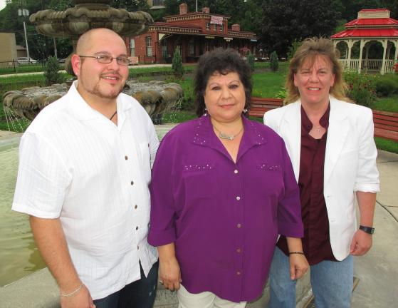 ANDREW LEIBENGUTH/TIMES NEWS Pictured from left are I.C.E. singers David Fortin, Marjorie Fortin and Tanya Erdman. The trio will perform the national anthem before the start of the Eagles and Steelers game this Thursday.