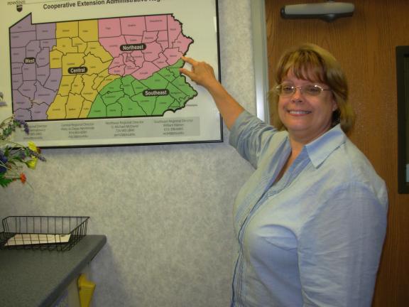 ADELE R. ARGOT/SPECIAL TO THE TIMES NEWS Pocono District Extension director Nancy Grotevant is well acquainted with the geography of the new area she must oversee. She has served, or lived in, each of the four counties she's pointing to Carbon,…