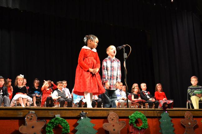 @$:SHERI RYAN/SPECIAL TO THE TIMES NEWS Students Katrina Kirk and Brendan Ragin from the kindergarten class of Mrs. Jill Niehoff recites "Christmas Dream" during the annual Panther Valley Elementary School Kindergarten Holiday Program on Monday night.