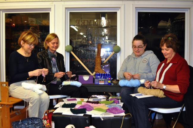 DONALD R. SERFASS/TIMES NEWS Tamaqua area volunteer knitters seen here Tuesday night have been spending hours producing Memory Squares from skeins of yarn. The squares will be assembled into quilts for victims of the Sandy Hook shooting. From left…