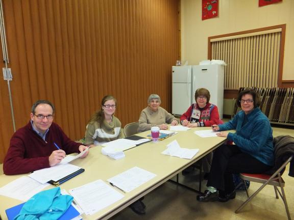 STACEY SOLT/SPECIAL TO THE TIMES NEWS @$:Board members of Big Brothers Big Sisters of the Bridge (Northeastern Pennsylvania), which serves Carbon County, finalize the details of the annual "Bowl for Kids' Sake" Bowlathon. This year's bowlathon will…