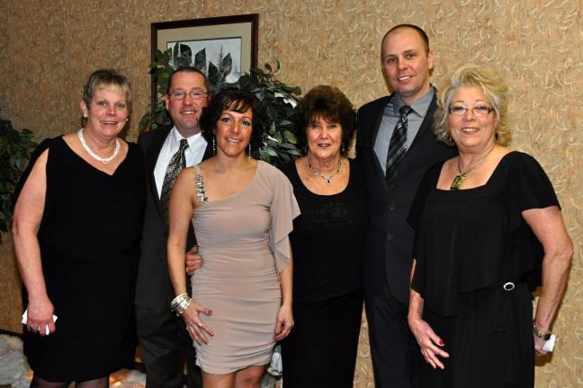 VICTOR IZZO/SPECIAL TO THE TIMES NEWS Jim Thorpe Policeman's Ball Committee members gathered in the lobby of Memorial Hall just prior to the start of their fifth annual event are, from left, Louise McClafferty, Police Chief Joseph Schatz, Tammy…