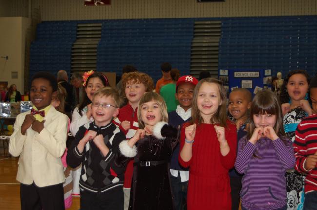 LINDA KOEHLER/TIMES NEWS Members of Pleasant Valley Elementary School's first grade students sing a captivating version of "Lean On Me" at PV's Night of Unity.