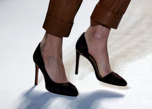 FILE - This Feb. 13, 2013 file photo shows a model wearing pointy shoes as the Rachel Zoe Fall 2013 collection is modeled during Fashion Week in New York. Sleek, sophisticated and ladylike, the pointy-toe shoe is coming back strong, pushing several…