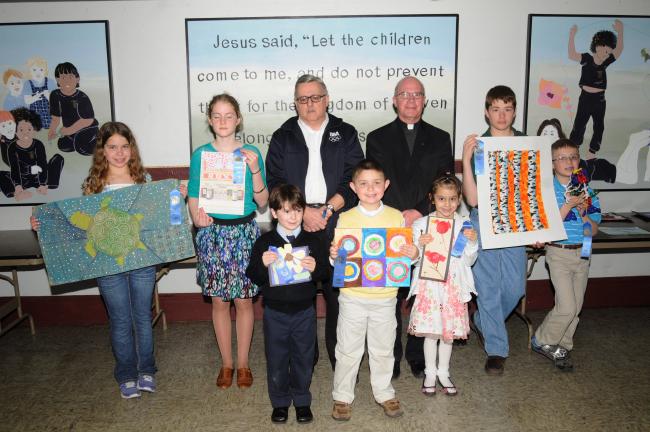 RON GOWER/TIMES NEWS First place winners in the District 5 CYO Arts and Crafts Show, held at Ss. Peter and Paul Catholic Church hall in Lehighton, include, front from left, Jesse Waksmunski, Angelo Greek and Kyelie Conrath; and back row, Kelci…