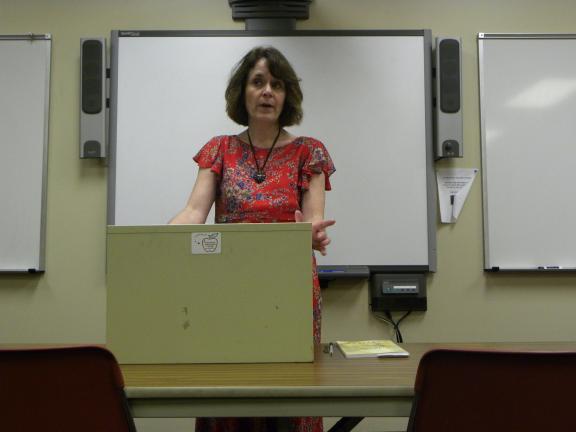 DANIELLE FOX/TIMES NEWS Lisa Covitch, author of "The Epidemic of Teen Pregnancy: The American Tragedy," discusses with an audience at Lehigh Carbon Community College how to approach teen pregnancy and support teenage mothers.