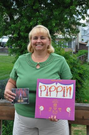AMY MILLER/TIMES NEWS Joan Kennedy of Summit Hill holds her original Pippin cast album, right; and the play's revival cast album. Kennedy was one of just over 200 people nationwide to be selected to sing in the recording of "No Time At All" for the album.