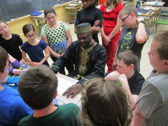 HEATHER BACSICK/SPECIAL TO THE TIMES NEWS Ibiyinka Alao, art ambassador for Nigeria to the United Nations, met with students at St. Joseph Regional Academy in Jim Thorpe recently. Alao spoke about being an artist, his work, and also conducted…