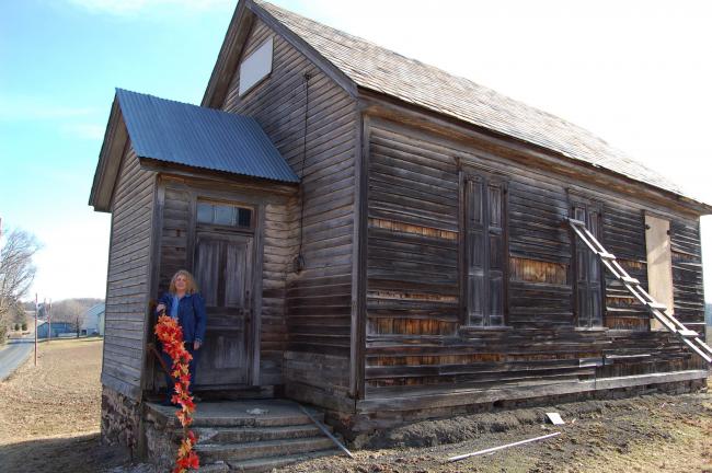 LINDA KOEHLER/TIMES NEWS  Lora Nothstein, secretary/treasurer of the Towamensing Historical Commission, hopes the community will help bring the Greenzweig School back to its original beauty.