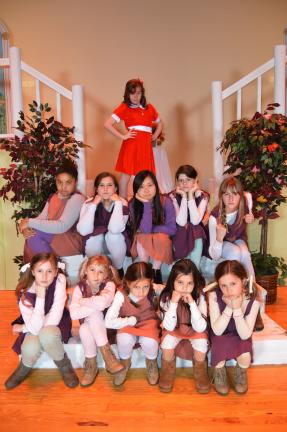 ABOVE: It's a hard-knock life for these orphans. Front from left, Olivia Bartholomew, Lily Heydt, Colee Fikentscher, Mikaylah Pruitte and Erin Remmel. Second row, Trinity Murphy, Stephanie Dykas, Grace Choi, Heater Moore and Rebecca Ripley. Top row,…