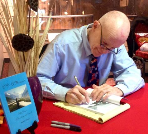 SPECIAL TO THE TIMES NEWS Michael E. O'Donnell signs copies of his book "Increasingly high water during Wednesday's rains called for flairs and orange cones to be placed along a section of Mountain Road in Slatington just east of the Pennsylvania…