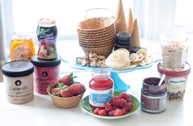 AP Photo/Matthew Mead Ice cream season supplies, from top left clockwise, ice cream waffle cones and bowls, Oreos, assorted nuts, dried pineapple, granola, Haagen-Dazs ice cream, chocolate sauce, raspberries, maraschino cherries, strawberries and…