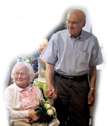 HALEY SAWYER/SPECIAL TO THE TIMES NEWS Anna and Ted Nagle and 11 other couples renewed their wedding vows at Heritage Hill Senior Community Thursday. The Nagles, who have been married for 62 years, exchanged vows originally on April 12, 1952.