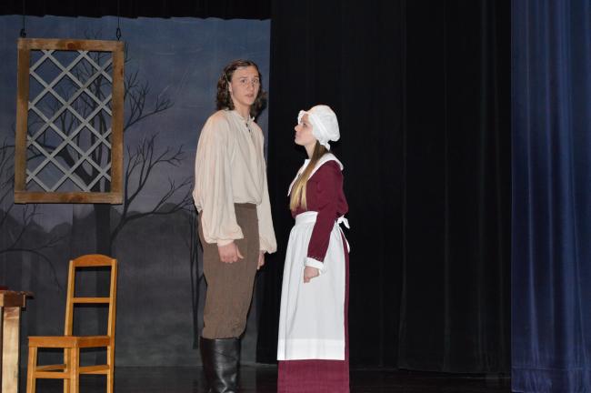 KATHY KUNKEL/TIMES NEWS Daniel Lee as John Proctor argues with his former mistress, Zoe Snyder as Abigail Williams, as the town of Salem brews hysteria over thoughts of witchcraft. The scene is from the Tamaqua High School Drama Club's presentation…