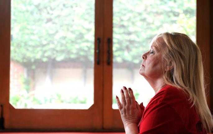 Judi Kaufman meditates during a yoga class at her home on Jan. 13, 2015 in Beverly Hills, Calif. Kaufman started writing poetry when a brain tumor made it hard for her to work, and her cancer is no longer treatable. (Wally Skalij/Los Angeles Times/TNS)