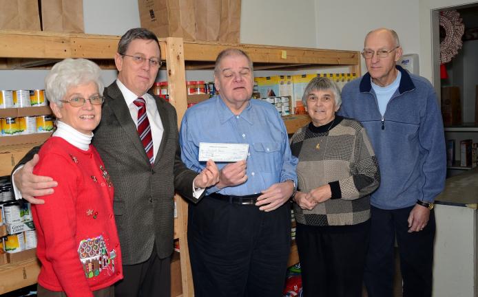 SHERI RYAN/SPECIAL TO THE TIMES NEWS Pictured from left are Carolyn Long, pantry co-coordinator; attorney Gregory Mousseau, chancellor of the bar association; Stanley Haupt, director of Shepherd House; Shirley Radler, secretary; and Ron Long, co…
