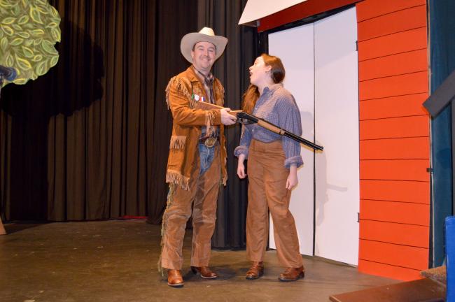 Bryan Buffington, who plays sharpshooter Frank Butler, and Mallory deForest, who plays Annie Oakley, rehearse a scene in "Annie Get Your Gun," which opens next Thursday in Lehighton.