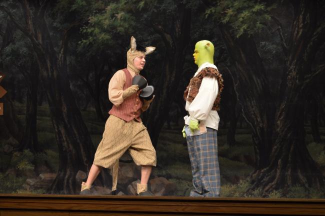 Shrek 1-Luis Silva, left, plays Donkey and Doug Stangl stars as Shrek in Pleasant Valley High School's performance of Shrek, the Musical. Performances will be held Friday and Saturday at 7 p.m. and Sunday at 2 p.m. in the high school auditorium. …