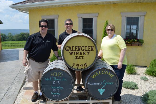 DYLAN MESSERSCHMIDT/TIMES NEWS From left, Vince Sciascia, Santisi director of operations; Mario Vicidomini, Santisi director and international logistics; and Kathleen Matson, Galen Glen Tasting Room manager.