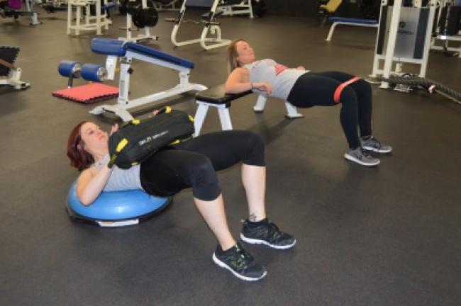 Raise your hips and lower them back to the ground. Repeat 20 times.