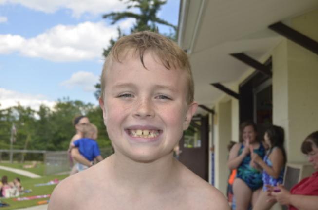 Tucker DeSousa, 8, of Lehighton: "I have to read, mow the grass, and write."