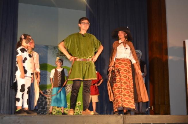 Jack, played by Roger Pomposello, and the Bean Seller, played by Madison Anthony, sing about magic beans. BENJAMIN WINN/TIMES NEWS
