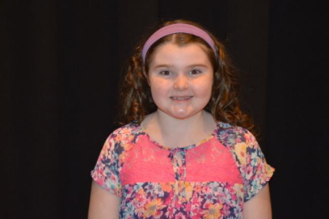 Delia Winas, fourth grade"We're going to maybe cook hamburgers and hot dogs and maybe watch movies on the big screen in our backyard and go to church to pray for those who served."