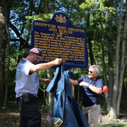 ABOVE: John Bova, left, son of entombed miner Louis Bova, unveils the Sheppton Mine Disaster historical marker on Saturday assisted by J. Ronnie Sando, believed to be the lone surviving rescuer. BELOW LEFT: Louis Bova, right, seen shortly before the…